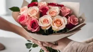 A beautifull roses in form of a bouquet that is exchanged by two people. Symbolizing the perfect timeless gift.